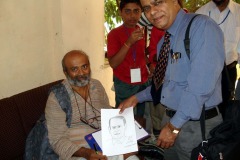 sri_vvvs_sastry_making_cartoon_of_the_scientoonist_20100206_1352232160